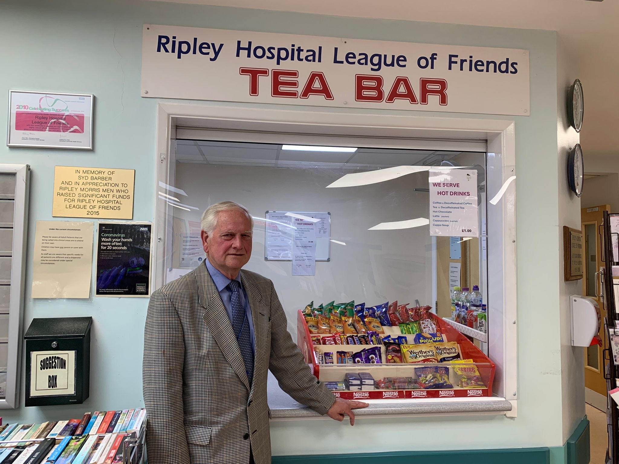 Photo of John stood outside tea bar - League of friends.